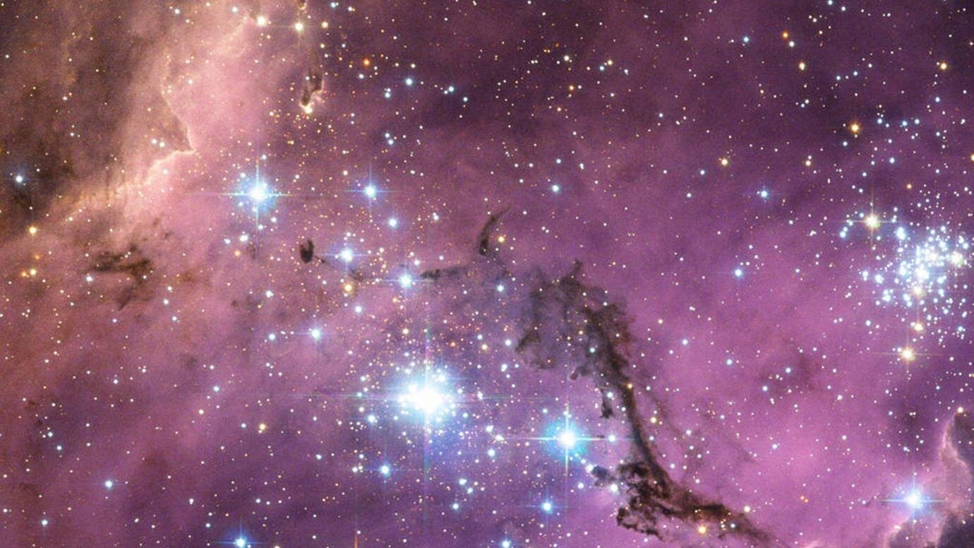 Le galassie satelliti fanno luce sulla materia oscura